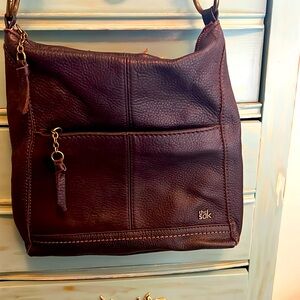 Beautiful brown leather bag with removable strap